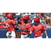 Spokane Indians exchange congratulations