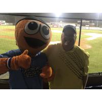 Author Fran Stuchbury poses with the Sock Puppets mascot