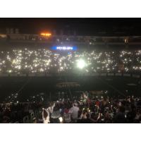 Phone lights illuminate Gas South Arena during a Georgia Swarm game