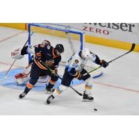 Greenville Swamp Rabbits' Ethan Somoza battles Toledo Walleye's Adrien Beraldo