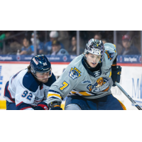 Saginaw Spirit's Nic Sima and Erie Otters' Owain Johnston on game night