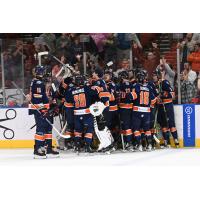 Greenville Swamp Rabbits gather after a win