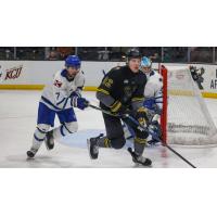 Wichita Thunder forward Nick Nardella (left) vs. the Iowa Heartlanders