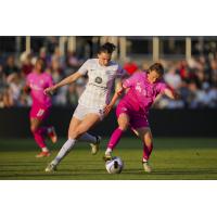 Savannah McCaskill of San Diego Wave FC (right) vs. Racing Louisville