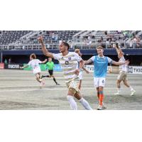 Louisville City FC's Elijah Wynder and Miami FC's Samuel Biek on game day