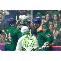 Saskatchewan Rush' Adam Jay and Halifax Thunderbirds' Clarke Petterson and Randy Staats on game night