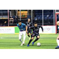 St. Louis Ambush look for possession against the Dallas Sidekicks