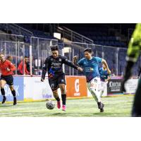 St. Louis Ambush midfielder Lucas Almeida (right) the Dallas Sidekicks
