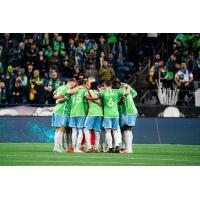 Sounders FC huddle