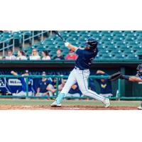 Matthew Etzel swings away for the Montgomery Biscuits