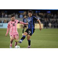 San Jose Earthquakes midfielder Beau Leroux (right) vs. Inter Miami CF's Lionel Messi