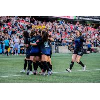 Ottawa Rapid FC celebrates a goal against Vancouver Rise FC