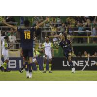 Rhode Island FC react after a goal against the Tampa Bay Rowdies