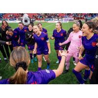 Calgary Wild FC celebrates their win over Montreal Roses FC