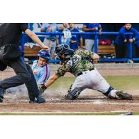 Biloxi Shuckers catcher Darrien Miller applies the tag against the Knoxville Smokies