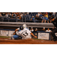 Jimmy Mantuano III of the Fond du Lac Dock Spiders slides home safely