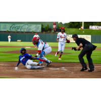 Jose Ramos of the Tulsa Drillers is tagged out at home plate