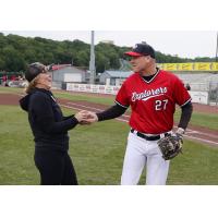 Sioux City Explorers pitcher J.D. Scholten greets a fan