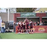Detroit City FC celebrates a goal