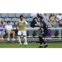 Birmingham Legion FC's Erik Centeno and Louisville City FC's Amadou Dia in action