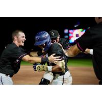 Pensacola Blue Wahoos congratulate centerfielder Shane Sasaki