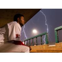 Fargo-Moorhead RedHawks watch the lightning from the dugout