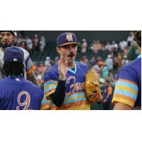 Montgomery Biscuits pitcher JJ Goss exchanges high fives