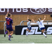 Ottawa Rapid FC reacts following a goal against Calgary Wild FC