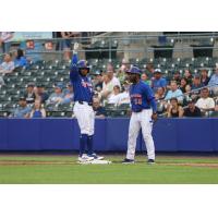 Yonny Hernandez (left) of the Syracuse Mets