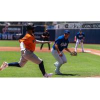 Tulsa Drillers pitcher Chris Campos looks to apply the tag
