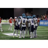 Massachusetts Pirates huddle against the Quad City Steamwheelers