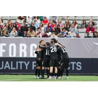 Atlético Ottawa huddle against Forge FC