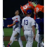 Joey Meneses gets the royal treatment from Syracuse Mets teammates