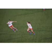Montreal Roses react after a goal