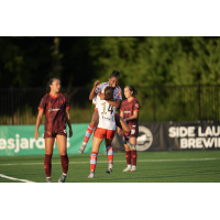 Montreal Roses celebrate a goal