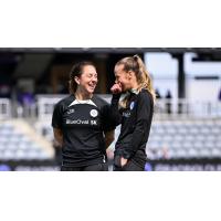 Racing Louisville FC assistant coach Carmelina Moscato (left)