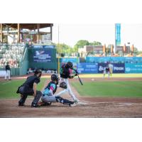 Greensboro Grasshoppers infielder Keiner Delgado at the plate