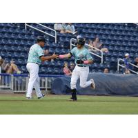 Biloxi Shuckers catcher Matthew Wood circles the bases
