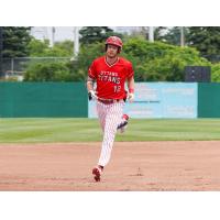 Ottawa Titans utility player Taylor Wright rounds the bases