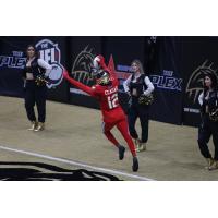 Vegas Knight Hawks defensive back James Ceasar celebrates his fumble return touchdown
