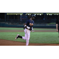 Emmanuel Tapia of the Down East Bird Dawgs rounds the bases