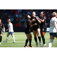 Portland Thorns celebrate a goal against the Seattle Reign