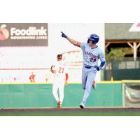 Jared Young of the Syracuse Mets rounds the bases