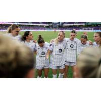 Racing Louisville FC huddle