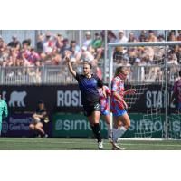 D. B. Pridham of Ottawa Rapid FC reacts after one of her goals