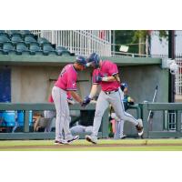 Pensacola Blue Wahoos round the bases