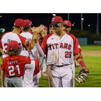 Ottawa Titans exchange high fives following a win