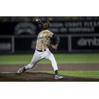 Tahnaj Thomas pitching for the Milwaukee Milkmen