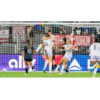 Racing Louisville FC reacts after a goal