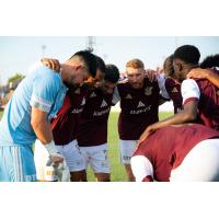 Detroit City FC huddle